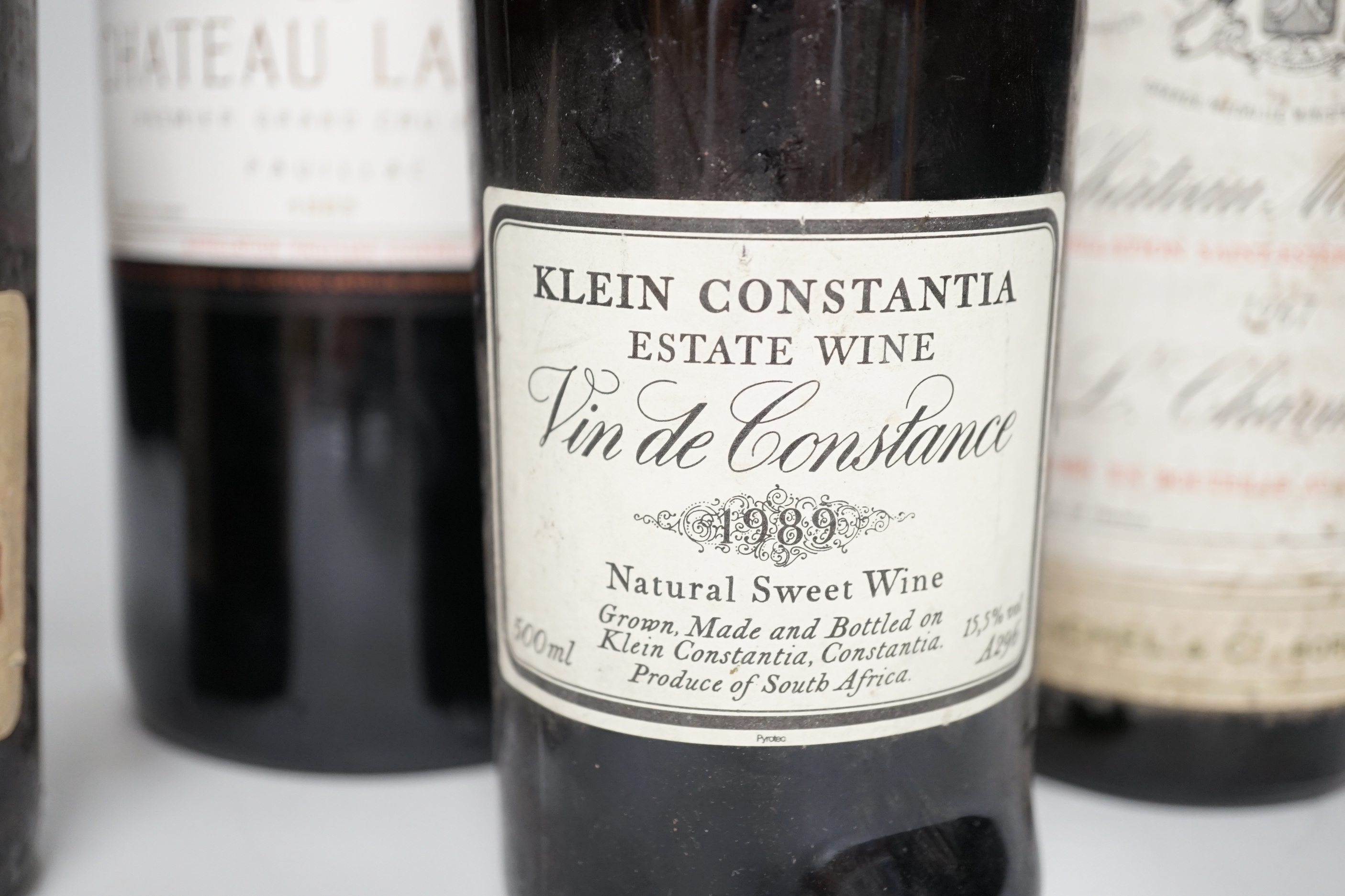 A magnum of Chateau Latour, 1983 and three other bottles of wine including Chateau Montrose, 1967.